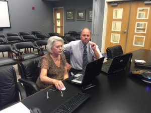 Kathryn LeRoy, senior advisor to APQC Education and Steve Carroll, Lee County Schools instructional supervisor and professional development coordinator, go over the district's plan to allow teachers to take control of their professional learning.