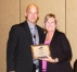 KAHPERD President Jamie Sparks congratulates Karen Baum, who received the KAHPERD Lifetime Member Award. Submitted photo by Jess Lawrence of Carin Guidance