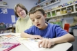 First-grade student Phillip Cummings works with reading teacher Nancy DeCoursey at Lacy Elementary School (Christian County) Feb. 2, 2011. Lacy Elementary is a 2010 Distinguished Title I School. Photo by Amy Wallot