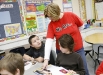 Cathy Midkiff talks with Bango Kelly, left, and Eli Daugherty during reading class at Sutton Elementary School (Owensboro Independent) Feb. 4, 2011. Sutton Elementary is a 2010 Distinguished Title I School. Photo by Amy Wallot