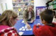 Mathematics intervention teacher Johnsie Tucker uses playing cards to help 3rd-grade students Ceely Farmer and Daniel Frantz with their mathematics skills at Sutton Elementary School (Owensboro Independent) Feb. 4, 2011. Sutton Elementary is a 2010 Distinguished Title I School. Photo by Amy Wallot