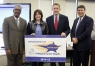 The Fort Thomas Independent school district was recognized as a District of Distinction for the 2014-15 school year by the Kentucky Board of Education at its February meeting. Pictured at the presentation of the District of Distinction banner are, from left, William Twyman, KBE vice chairman; Karen Allen, Fort Thomas Independent Board of Education chairwoman; Gene Kirchner, Fort Thomas Independent superintendent; and Stephen Pruitt, Kentucky education commissioner. Photo by Mike Marsee, Feb. 3, 2016