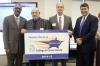 The Hickman County school district was recognized as a District of Distinction for the 2014-15 school year by the Kentucky Board of Education at its February meeting. Pictured at the presentation of the District of Distinction banner are, from left, William Twyman, KBE vice chairman; Allen Kyle, Hickman County Board of Education chairman; Casey Henderson, Hickman County superintendent; and Stephen Pruitt, Kentucky education commissioner. Photo by Mike Marsee, Feb. 3, 2016