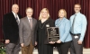 The University of Kentucky Partnership Institute for Math and Science Education Reform (PIMSER) was recognized as a co-winner of the 2016 Dr. Samuel Robinson Award by the Kentucky Board of Education at the board’s February meeting. Receiving the award were, from left, Stephen Henderson, retired director of the Central Kentucky Educational Cooperative; Kim Zeidler-Watters, director of PIMSER; Diane Johnson, assistant director of PIMSER; and Tim Schneider, teaching leader for secondary education in the Campbell County school district. Photo by Mike Marsee, Feb. 3, 2016