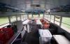 The inside of the Exploration Station bus features room for reading and other activies, WiFi and DVD players with large monitors, storage areas and air conditioning. The bus was used this summer by Daviess County schools to prevent summer slide, but it will get plenty of use during the school year as well. Photo by Bobby Ellis, July 18, 2016