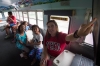 Jennifer Baird, a teacher at Southern Oaks Elementary School (Daviess County), points to a screen as she teaches students on the Exploration Station bus about U.S. history. Educators in six Daviess County elementary school used the bus in different ways to reach their students during the summer. Photo by Bobby Ellis, July 18, 2016