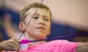 Stephen Dodson, a 6th-grader at Spencer County Middle School, eyes a target during the archery club. Students in this club are taught safe shooting skills and are encouraged to try out for the school’s archery team. Photo by Bobby Ellis, March 30, 2016