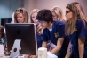 Abdullah Sher and other Hazard Middle School (Hazard Independent) students set up a desktop before the start of the STLP finals. Photo by Bobby Ellis, April 22, 2016