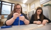 Casey Lail, left, marks a measurement on a piece of balsa wood as Madison Myers cuts another piece during a construction project in their class at the Kenton County Schools’ Women’s Engineering Academy. They are among 13 freshman girls taking part in the first year of the academy, which is part of the Kenton County Academies of Innovation and Technology program. Photo by Bobby Ellis, April 7, 2016