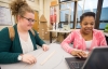 Luna Smith, left, and Su'Mya Herndon-Jones work on their wall-building project together in Adam Klaine’s engineering class. The Women’s Engineering Academy students spend half of their school day in the program taking classes in engineering, mathematics and English. Photo by Bobby Ellis, April 7, 2016