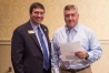 Education Commissioner Stephen Pruitt congratulates Principal Rick Snodgrass of Hopkins County Central High School for being recognized by the Kentucky Department of Education as a best practice. Photo by Bobby Ellis, Sept. 20, 2016
