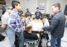 Mike Wagers, right, an aeronautics teacher at Frankfort High School (Frankfort Independent), discusses plotting courses with students in one of his classes. The classes at Frankfort also include students from Franklin County, Western Hills (Franklin County) and Anderson County high schools. Photo by Mike Marsee, Sept. 22, 2015