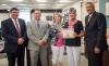 The McCracken Regional School in McCracken County was recognized as one of seven 2016 Alternative Programs of Distinction during the Kentucky Board of Education meeting in June. Kentucky Education Commissioner Stephen Pruitt, left, and then-KBE Chairman Roger Marcum presented a certificate to McCracken County Director of Pupil Personnel Brian Bowland, Teacher Crystal Culp and Head Teacher Lucinda Mills. Photo by Bobby Ellis, June 8, 2016