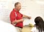 Mike Listerman teaches geometry at the Transformational Learning. Tony Perkins, director of the Covington Independent schools’ alternative program, said staff members focus on developing strong relationships with the students.  Photo by Amy Wallot, May 7, 2015