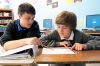 Students Tyler Adkins and Hunter Boone work together on an assignment at the Bullitt Alternative Center (Bullitt County). Photo by John Roberts/Bullitt County Schools
