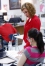 Amy Futrell teaches students how to use a checking account at the Calloway County Alternative Education Center and Calloway County Day Treatment Center. Travis Anderson, the principal at the facility that houses both of the programs, said they both are able to stand out because of a strong commitment from the board of education. Photo by Amy Wallot, May 12, 2015