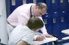 Alternative Instructional Facility Director and Principal Travis Anderson helps a student with a math problem at the Calloway County Alternative Education Center and Calloway County Day Treatment Center.  Photo by Amy Wallot, May 12, 2015