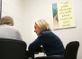 Lori Price, coordinator of student/family support services for Pulaski County Schools, talks with a freshman student about his concerns with new classes he is enrolling in. Price uses the Check & Connect intervention system to foster engagement with students. 
Photo by Amy Wallot, Feb. 12, 2015