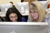 Science teacher JoAnn Hall helps 7th-grade student Caitlin Wels explore careers in the business field at Hazard Middle School (Hazard Independent).
Photo by Amy Wallot, March 10, 2015