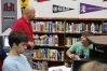 Counselor Chris Reeves talks with senior Robby Rundle about his essay for the Common App during College Application Bootcamp at Beechwood High School (Beechwood Independent). Rundle plans on studying criminal Justice. Photo by Amy Wallot, Aug. 6, 2013