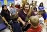 Susan Brock talks with her 4th-grade science class about the paludarium they built with pill bugs, snails and guppies at Bell Central School Center (Bell County). Photo by Amy Wallot, May 15, 2013