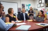 Robb Smith, superintendent of Bellevue Independent, center, meets with Boone County teachers and administrators after the educators observed classrooms at Grandview Elementary. The Northern Kentucky Cooperative for Educational Services has brought more than 10 districts to visit the school so far this school year. Photo by Bobby Ellis; Nov. 2, 2016