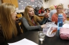 Seniors Madison Funke, Emily Graham and Jordan True monitor the breathing rate of a gold fish in changing water temperature. Photo by Amy Wallot, Sept. 17, 2014