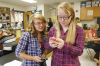 Sophomore Grace Osterbrock and junior Airelle McStoots tweet out their experiment results during Tricia Shelton's anatomy class at Boone County High School.Photo by Amy Wallot, Sept. 17, 2014