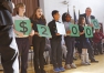 Commissioner Terry Holliday adds one more zero to the award amount, for a total of $25,000, to be given to the Milken Family Foundation National Educator Award winner.  Photo by Amy Wallot, Jan. 15, 2015