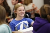 Eighth-grade student Marian Tiemeier works in a small group during Faye Smith's Algebra 1 class. Photo by Amy Wallot, April 17, 2015