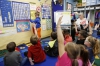 First-grade student Jett Seidel leads the class in the mooring routine of  deciding information about the day like what day of the week it is and what the weather is like during substitute teacher Marla English's class at  Central Elementary School (Marshall County).Photo by Amy Wallot, April 21, 2015