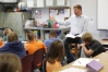 Fifth-grade teacher Brian Recktenwald talks to his class about economics at Clear Creek Elementary School (Shelby County). Photo by Amy Wallot, May 16, 2014