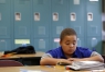 Fifth-grade student Keveon Beach focuses on finding the most important information while he reads during Gigi Pattison\'s class at Clear Creek Elementary School (Shelby County). Photo by Amy Wallot, May 16, 2014