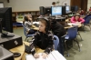 First-grade student Cam Estep works on a computer in one section of the library.  Photo by Amy Wallot, Dec. 2, 2014