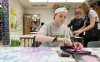 Rachel Palmer, an 8th-grade student at Drakes Creek Middle School (Warren County) makes a tesselation during the art portion of the Academy at the Creek, a program for the school's gifted and talented students. The academy originally was centered on mathematics and science but has evolved to focus on STEAM (science, technology, engineering, arts and mathematics) disciplines. Photo by Bobby Ellis, April 25, 2018
