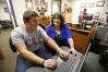 School counselor Sheila Porter reviews colleges with senior Caleb Wilburn in her office at East Carter High School. During college application week at the school all seniors must apply to at least one college. Wilburn is considering studying pastoral ministries at Campbellsville University. Photo by Amy Wallot, Oct. 17, 2013