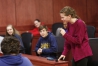Freshman Olivia Bryan presents a guilty verdict from the jury during a trial in the Law and Justice Village at Elkhorn Crossing School (Scott County). Photo by Amy Wallot, March 20, 2015