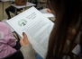 Alexis Harding looks over a flyer that provides details about the Ivy Plus Academy. The program's goal is to serve up to 200 students per year. Photo by Bobby Ellis, Feb. 14, 2017