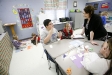 Jessica McPherson helps 4th-grade students Keaton Emmert and Morgan Comer with an assignment on equivalent fractions at Gamaliel Elementary School (Monroe County). Photo by Amy Wallot, Feb. 2, 2012