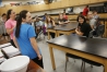 Sixth-grade students Macy Helton and Alli Atwell present to a class about the aquaponics system they work with in class at Bryan Station Middle School (Fayette County). Photo by Amy Wallot, May 8, 2015