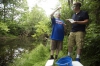 Eighth-grade students Ethan Clayburn and Cameron Rice test the water of Dry Run Creek at Royal Spring Middle School (Scott County). The creek runs through the school property and teachers are able to use the space for outdoor learning. Photo by Amy Wallot, May 26, 2015
