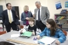 Superintendent James Frank, science teacher Jessica Holt and Commissioner Terry Holliday observe student work in Hall\'s class at Green County Middle School. Photo by Amy Wallot, Jan. 15, 2013
