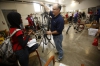 Student Majdaah Salaah and Chuck Kohl, a community volunteer from Fidelity Investments, work together to assemble a bike.  Photo by Amy Wallot, April 13, 2015