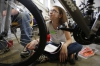 Sixth-grade student Azriel Senglebach listens as volunteer Alex Swearingen talks about the math and engineering concepts used in bike assembly.  Photo by Amy Wallot, April 13, 2015