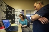 iLEAD student Storm Mitchell, left, talks with Mike Drake of Kentucky Utilities about her reverse engineering project at the school's demonstration night. Photo by Bobby Ellis, March 24, 2016