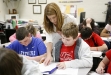 Melissa Henson helps 7th-grade student Dustin Allen with a peer review of an editorial writing piece at Jackson City School (Jackson Ind.). Photo by Amy Wallot, April 2011