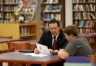 Superintendent James Flynn talks with sophomore Will Yates during Operation Preparation about Yates' plans for college. Photo by Amy Wallot, Dec. 4, 2014​