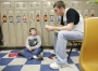 West Carter County High School (Carter County) senior Zac Brasington reads to 4th-grade student Michael Knipp at Upper Tygart Elementary School. Photo by Amy Wallot, March 3, 2008