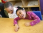 Preschool students Bryce Johnson and Chyna Lofton laugh together before snack time during  Maggie Tibbles\' class at Hogsett Elementary School (Danville Independent).Photo by Amy Wallot, Jan. 7, 2008