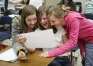 Sixth-grade students Madison Kemble, Emily Davidson and McKenna Kemble read a short story they were working on at the Edmonson County 5/6 Center (Edmonson).Photo by Amy Wallot, Feb. 4, 2010